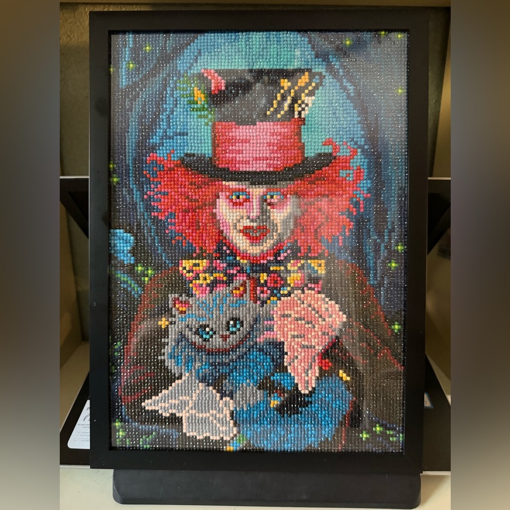 Completed diamond art mad hatter framed added glue sealant